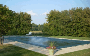 nice safety cover streched over a pool